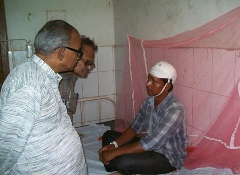 Bakshi with an Injured at the Hospital